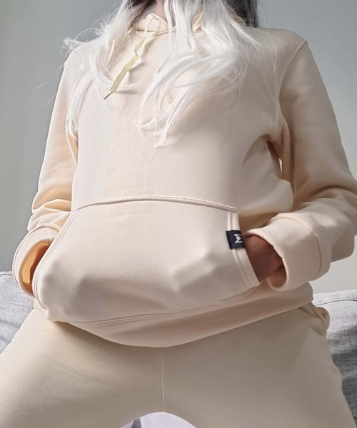 ivory hoodie from an Australian designer. after pay available. Misha world. ivory sweater. titter trends. nike wear. nike socks.