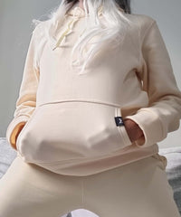 ivory hoodie from an Australian designer. after pay available. Misha world. ivory sweater. titter trends.
