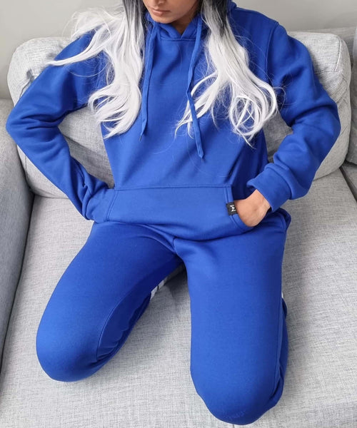 madola the label blue sweat pant. tie Tok trendy. Australian fashion designer. Misha world. fashion must haves.