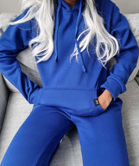 madola the label blue sweat pant. tie Tok trendy. Australian fashion designer. Misha world. fashion must haves.