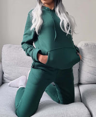Olive green hoodie Australian fashion designer. fashion week in a hoodie. Misha world hoodie. casual stay home. til Tok trends. work from home outfit.